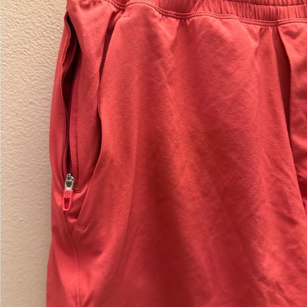 Lululemon Pace Breaker Shorts Coral Pink Mesh Vent Zipper Pockets Size S LM7BC0S